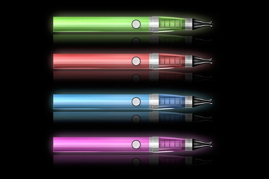 Colorful e cigarettes on black background