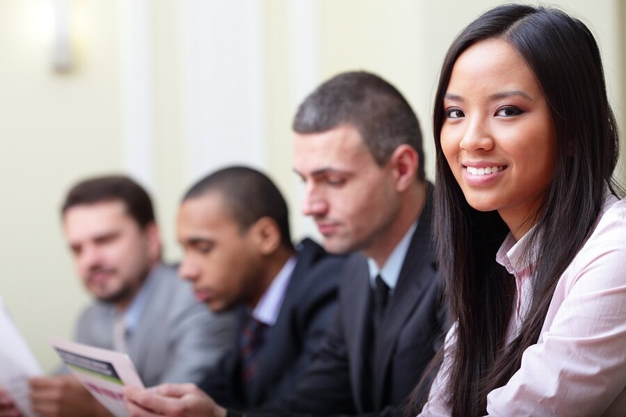 Woman with male coworkers