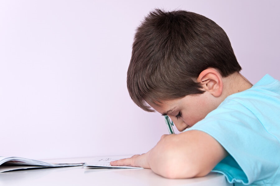 boy meditating, focusing on test