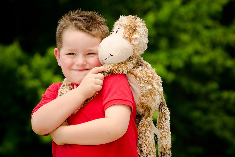 boy with stuffed animal lovey