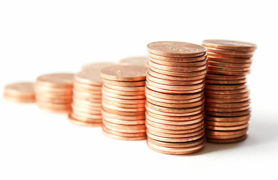 Halloween candy leftovers, stacks of pennies