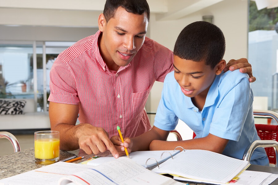 dad helping son with test