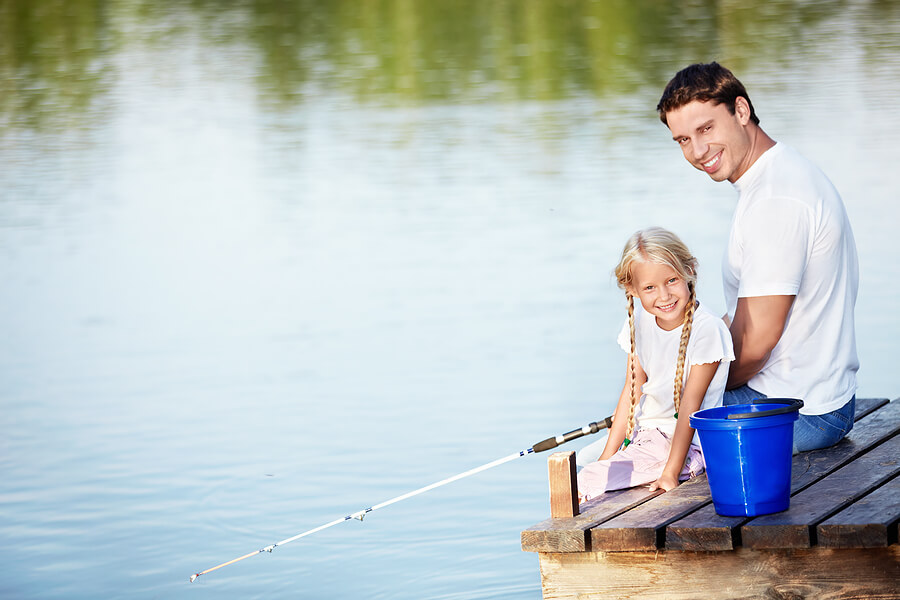 Fathers Day activities, father and daughter fishing in lake