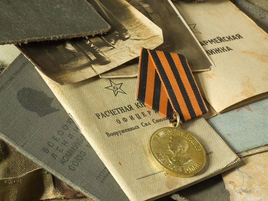 Pile of old army documents and passports