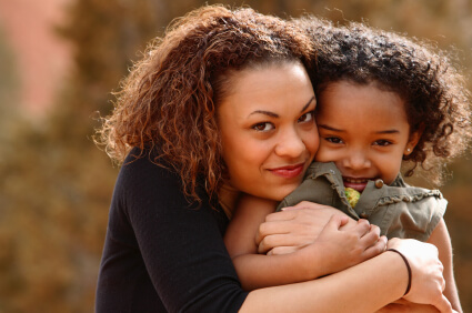 AfricanAmericanmotheranddaughterhugging